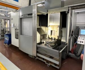 DescriptionDetailsConditions and sizeInstalled Options Description* Heidenhain CNC model CNC version iTNC 530 Tool attachment HSK 63 Spindle power 35 Kw Number of spindle revolutions 18000 Number of tools 60 X-axis travel 885 mm Y-axis travel 600 mm Z-axis travel 600 mm Rapid linear axis feeds X Y Z 90 m/min Roller Guides Fourth-axis head yes Continuous fourth-axis head type Fourth-axis head degrees -10° +110° Rotary table yes Type continuous rotary table Table size 750 mm Allowable load on the table 600 kg Details CNC:Heidenhain CNC version:iTNC 530 X axis:885 mm Y axis:600 mm Z axis:600 mm Table – Pallet dimensions :750 mm x mm Max load on table:600 kg Number of controlled axes:5 Number of tools:60 Spindle taper toolholders:63 BT / SK / ISO / HSK Spindle speed rotation:18000 rpm Through spindle coolant:Yes Power:35 kW Chip conveyor:Yes Conditions and size Status:Visible Condition:Good Length:32135 mm Width:2610 mm Height:3150 mm Installed Options Through spindle coolantChip conveyor * Description may have been automatically translated. Please contact us for further details. Machine available prior sale. Technical specifications are not binding and may be modified without notice. Used DECKEL MAHO DMC 75V Linear 5 axis machining center