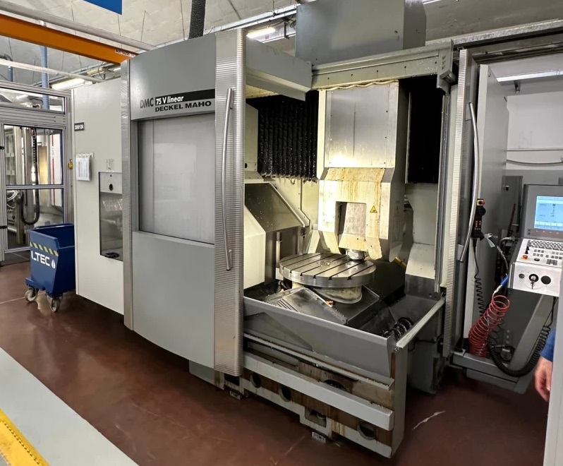 DescriptionDetailsConditions and sizeInstalled Options Description* Heidenhain CNC model CNC version iTNC 530 Tool attachment HSK 63 Spindle power 35 Kw Number of spindle revolutions 18000 Number of tools 60 X-axis travel 885 mm Y-axis travel 600 mm Z-axis travel 600 mm Rapid linear axis feeds X Y Z 90 m/min Roller Guides Fourth-axis head yes Continuous fourth-axis head type Fourth-axis head degrees -10° +110° Rotary table yes Type continuous rotary table Table size 750 mm Allowable load on the table 600 kg Details CNC:Heidenhain CNC version:iTNC 530 X axis:885 mm Y axis:600 mm Z axis:600 mm Table – Pallet dimensions :750 mm x mm Max load on table:600 kg Number of controlled axes:5 Number of tools:60 Spindle taper toolholders:63 BT / SK / ISO / HSK Spindle speed rotation:18000 rpm Through spindle coolant:Yes Power:35 kW Chip conveyor:Yes Conditions and size Status:Visible Condition:Good Length:32135 mm Width:2610 mm Height:3150 mm Installed Options Through spindle coolantChip conveyor * Description may have been automatically translated. Please contact us for further details. Machine available prior sale. Technical specifications are not binding and may be modified without notice. Used DECKEL MAHO DMC 75V Linear 5 axis machining center