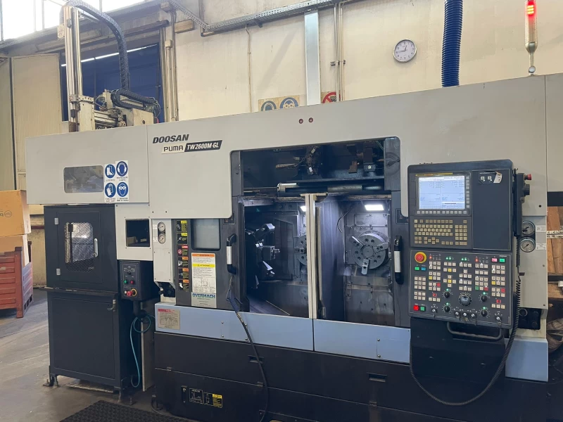 DOOSAN Puma TW2600M GL CNC lathe in excellent condition, ready for automated production with Gantry Loader